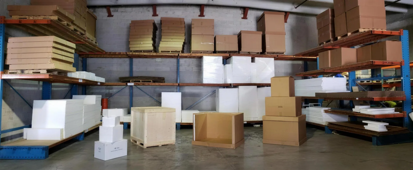 Sub-Zero Dry Ice warehouse re-packing temperature-sensitive cargo with insulated coolers and dry ice